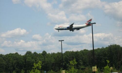 Plane landing at Dulles Airport, which is adjacent to the National Air and Space Museum Udvar-Hazy Center, Chantilly, VA National Air and Space Museum Udvar-Hazy Center, Chantilly, VA