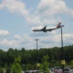 Plane landing at Dulles Airport, which is adjacent to the National Air and Space Museum Udvar-Hazy Center, Chantilly, VA National Air and Space Museum Udvar-Hazy Center, Chantilly, VA